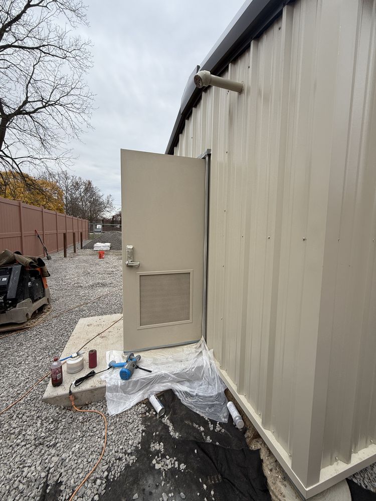 Freshly finished industrial door and metal wall panel