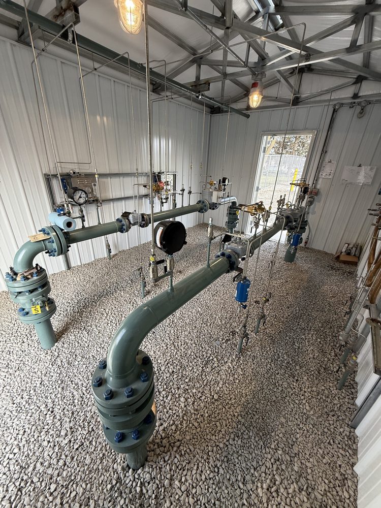 Finished coated piping and valves inside a mechanical room